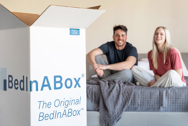 Couple on Bed with Mattress Box